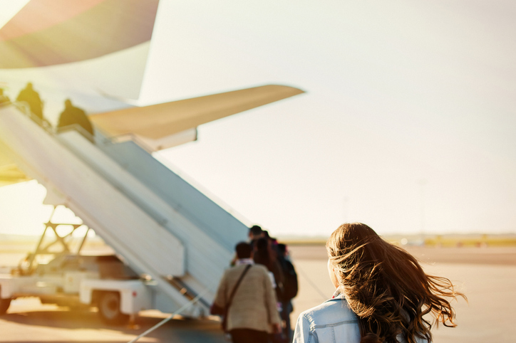 woman boarding a plane