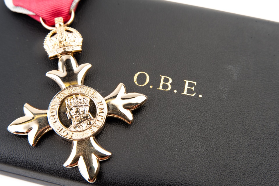 OBE Medal on a black case
