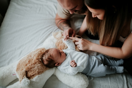 parents with newborn baby